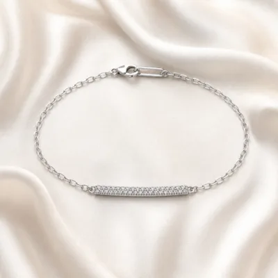 pulseira prateada com barra de cristais em cetim marfim, referencia 85248-02