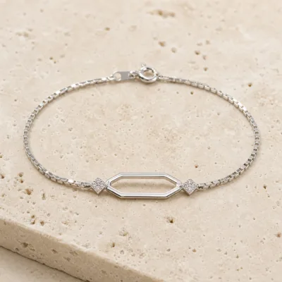 pulseira prateada geométrica com cristais em pedra clara de tom quente, referencia 85248-03