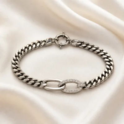 pulseira prateada entrelaçada com cristais em cetim marfim, referencia 85248-03