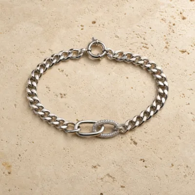 pulseira prateada entrelaçada com cristais em pedra clara de tom quente, referencia 85248-03