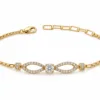 pulseira dourada laço infinito com cristal em fundo branco, referencia 85250-01