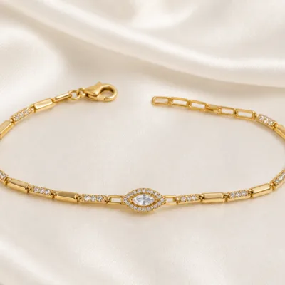pulseira dourada com cristal marquise em cetim marfim, referencia 85250-01