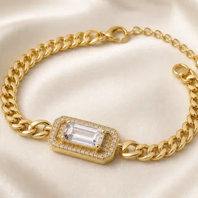 pulseira dourada de corrente grossa com cristal em cetim marfim, referencia 85251-01
