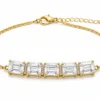 pulseira dourada com cinco cristais quadrados em fundo branco, referencia 85251-01