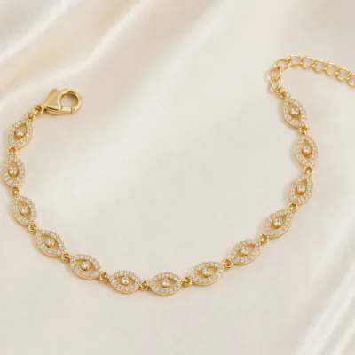 pulseira dourada com elos olho pavé em cetim marfim, referencia 85251-02