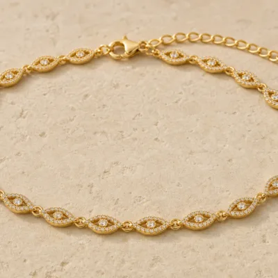 pulseira dourada com elos olho pavé em pedra clara de tom quente, referencia 85251-02