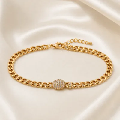 pulseira dourada curb com pavé em cetim marfim, referencia 85251-02