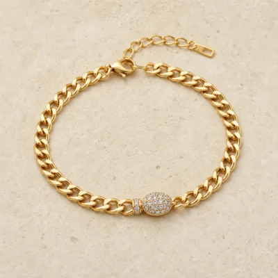 pulseira dourada curb com pavé em pedra clara de tom quente, referencia 85251-02
