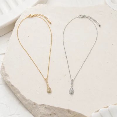 Comparação dos colares dourado e prateado com pendente gota, vendidos separadamente