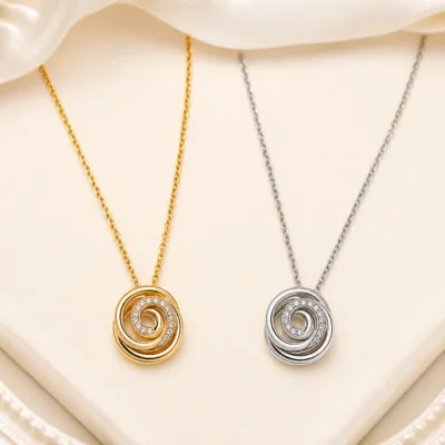 Colares em espiral dourado e prateado, vendidos separadamente