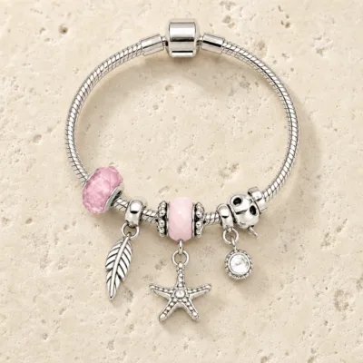 pulseira prateada rosa em pedra clara de tom quente, referencia 85326-3