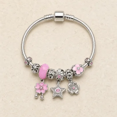 pulseira prateada rosa com flores em pedra clara de tom quente, referencia 85327-1