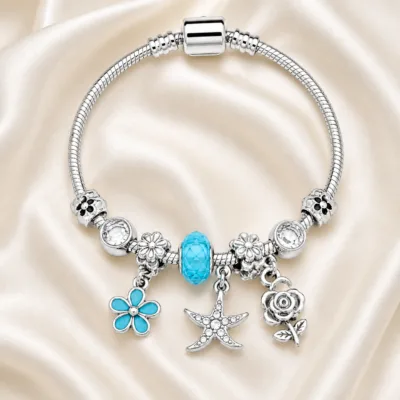 pulseira prateada azul-turquesa em cetim marfim, referencia 85327-1