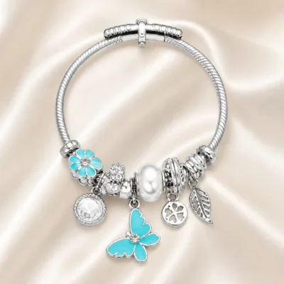 pulseira prateada turquesa com pérola em cetim marfim, referencia 85327-2