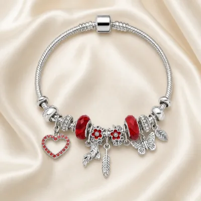 pulseira prateada vermelha com coração em cetim marfim, referencia 85327-3