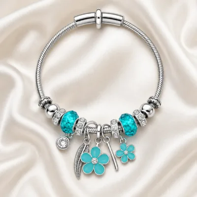 pulseira prateada turquesa com flores em cetim marfim, referencia 85327-4