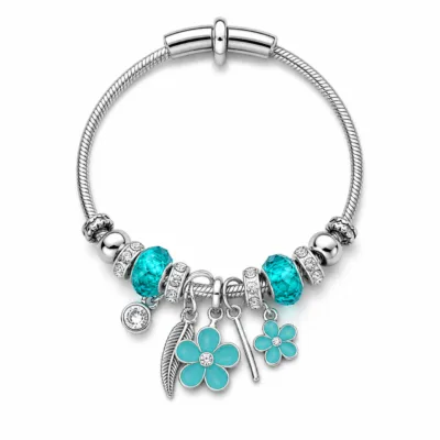 pulseira prateada turquesa com flores em fundo branco, referencia 85327-4