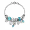 pulseira prateada turquesa com cristais em fundo branco, referencia 85327-5
