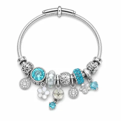 pulseira prateada turquesa com cristais em fundo branco, referencia 85327-5