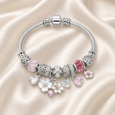 pulseira prateada rosa com flores em cetim marfim, referencia 85327-5