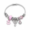 pulseira prateada rosa com urso em fundo branco, referencia 85327-6