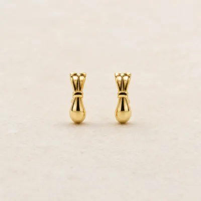 Brincos fashion dourados laço com gota polida