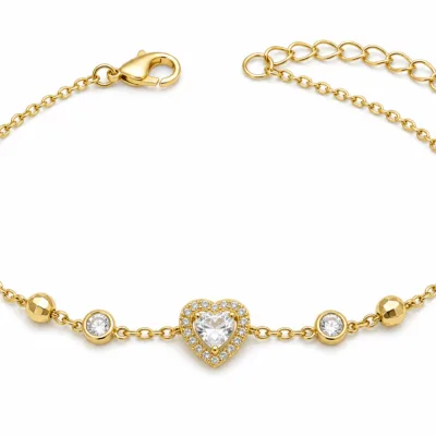 pulseira dourada com coração de cristal e halo em fundo branco, referência 85384-5