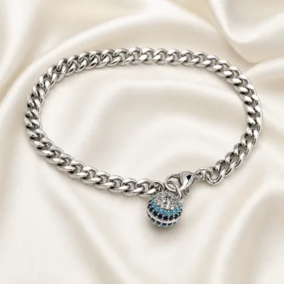 pulseira prateada com esfera turquesa em cetim marfim, referencia 85397-2