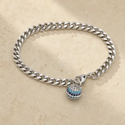 pulseira prateada com esfera turquesa em pedra clara de tom quente, referencia 85397-2