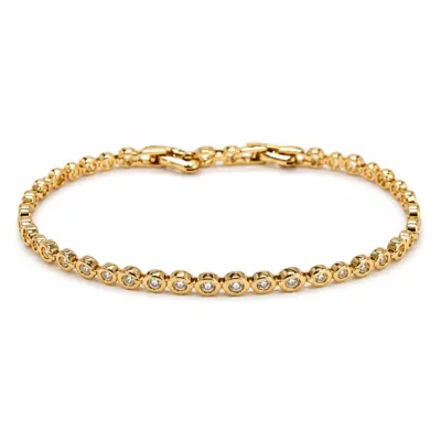 pulseira dourada com elos e zircões em fundo branco, referencia 85400-1