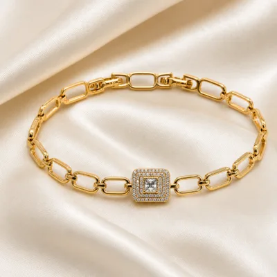 pulseira dourada com cristal quadrado em cetim marfim, referencia 85401-1