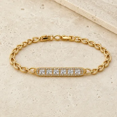 pulseira dourada com barra de cristais em pedra clara de tom quente, referencia 85402-2