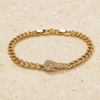 pulseira dourada cubana com mão de zircões em pedra clara de tom quente, referencia 85403-2