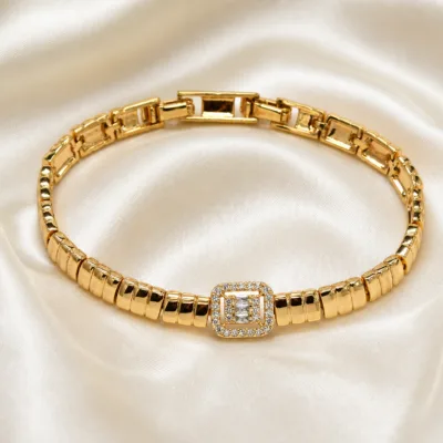 pulseira dourada quadrada com zircões baguette em cetim marfim, referencia 85404-1