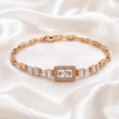 pulseira ouro rosa com cristais baguette em cetim marfim, referencia 85405-2