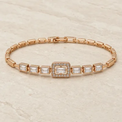 pulseira ouro rosa com cristais baguette em pedra clara de tom quente, referencia 85405-2