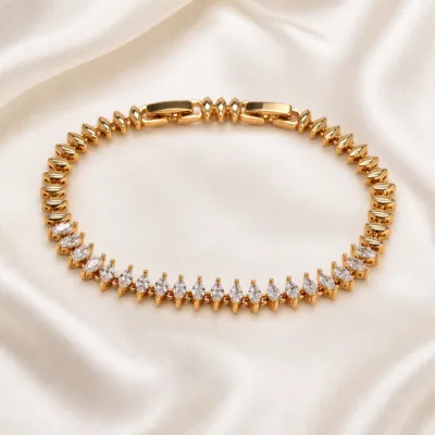 pulseira ouro rosa com cristais navette em cetim marfim, referencia 85406-1