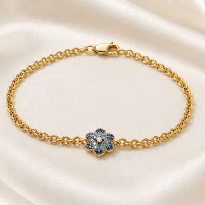 pulseira dourada com cristais azuis, Flor Azul de Seis Pétalas, em cetim marfim, referencia 85407-1,2