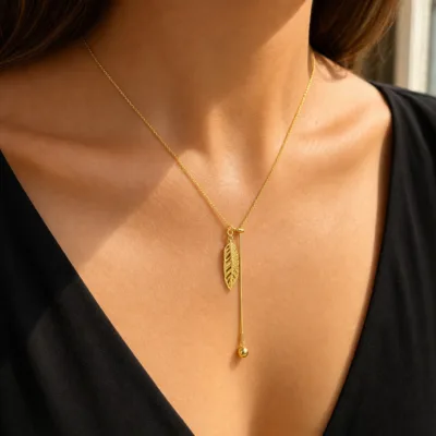 colar dourado em Y com folha, cetim marfim, referência 85417-2