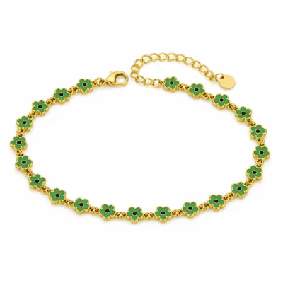Pulseira dourada de flores verdes em fundo branco