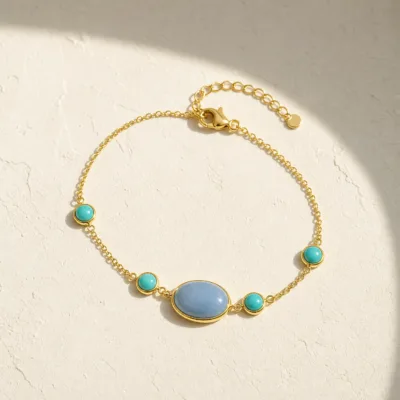 Pulseira Dourada com Pedra Azul, referência 85439-2-D