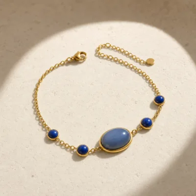 Pulseira Dourada com Pedra Azul Denim, referência 85439-2-E
