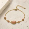Pulseira Dourada com Pedra Rosa Bege, referência 85439-2-F