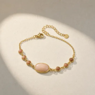 Pulseira Dourada com Pedra Rosa Bege, referência 85439-2-F
