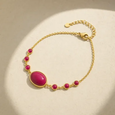 Pulseira Dourada com Pedra Magenta, referência 85439-2-G