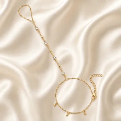 pulseira de mão dourada com quatro cristais e contas em cetim marfim, referência 85475-1