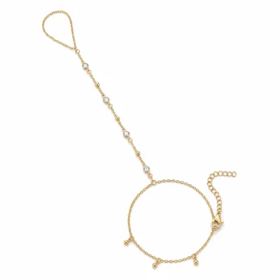 pulseira de mão dourada com quatro cristais e contas em fundo branco, referência 85475-1