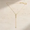 Colar Dourado em Y com Cristais em Aço Titânio — Único — Dourado