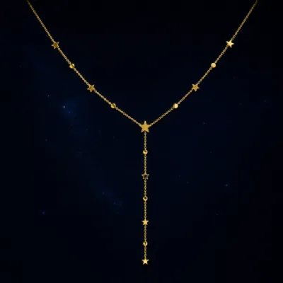 colar dourado em Y com estrelas, fundo branco, referência 85479-1