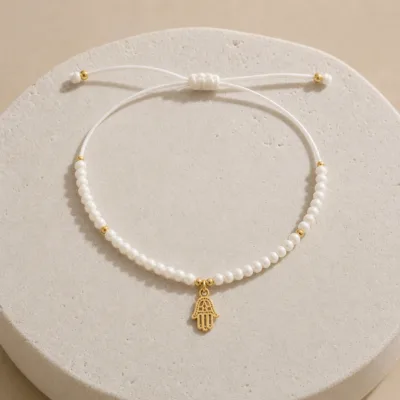 tornozeleira branca com pendente, variante dourada, pedra clara, referência 85554-2
